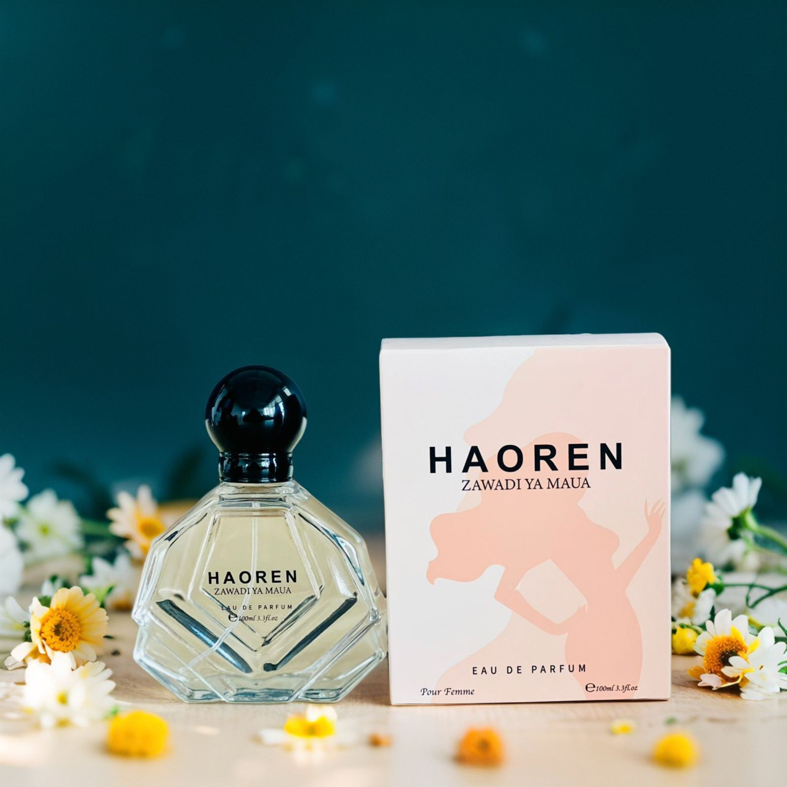 Hand holding perfume bottle